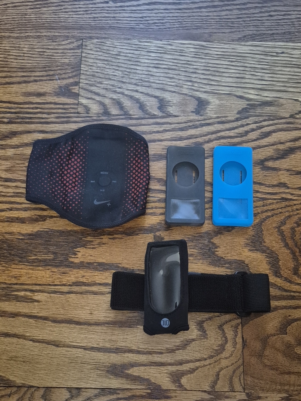 NWOT!! IPod Cases: Two Armbands and Two Silicone Skin Case Covers